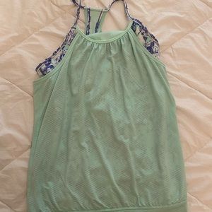 Ivivva by lululemon double tank size 14 but fits 4